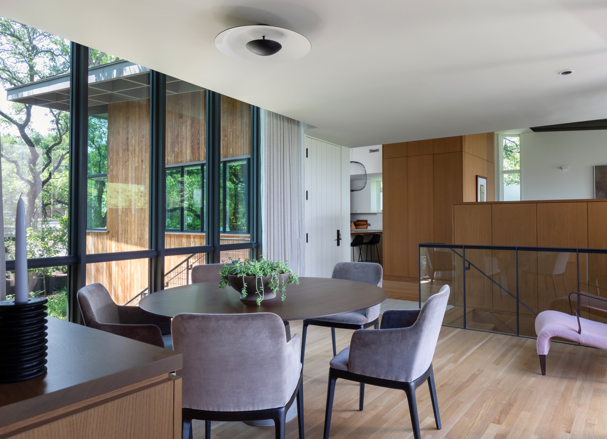 View from the bridge toward the entry of a modern Austin house