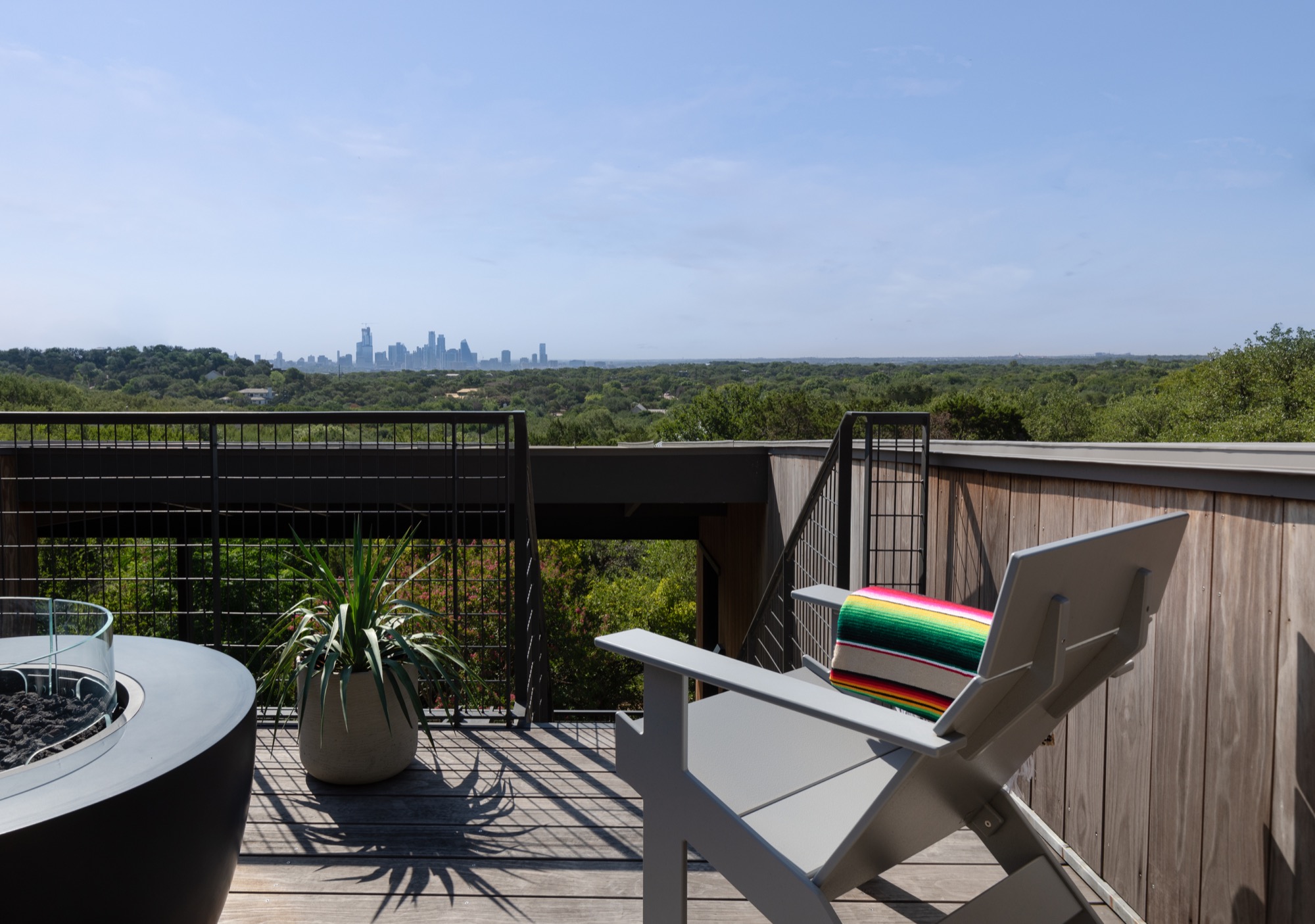Roof terrace of a modern Austin house with a skyline view